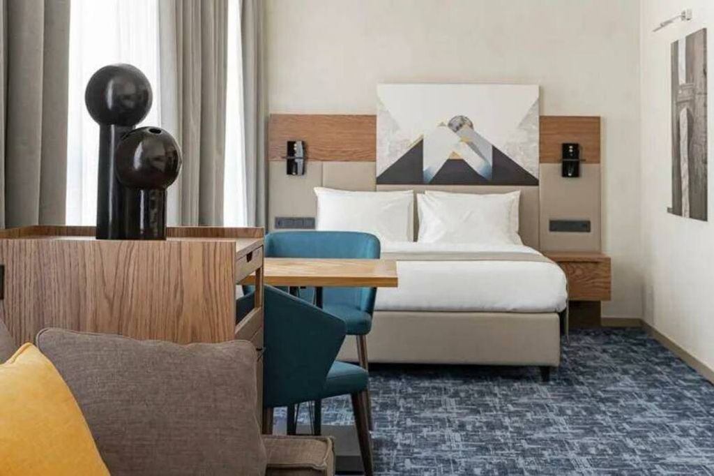 Двухместный номер с 1 кроватью Джуниор сюит