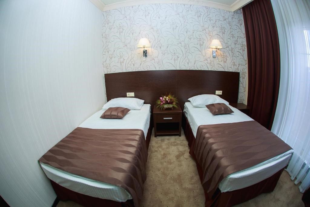 Двухместный номер с 2 отдельными кроватями делюкс