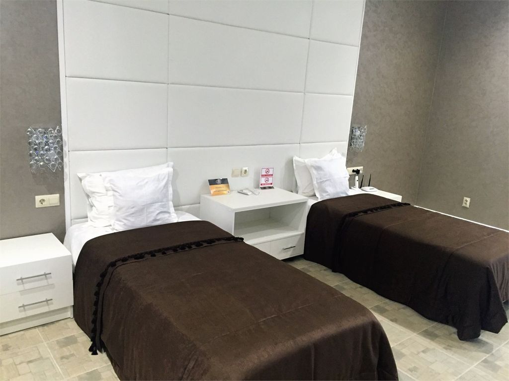 Двухместный номер с 2 отдельными кроватями стандарт