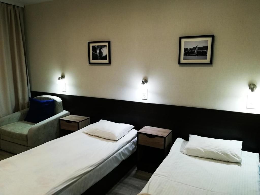 Двухместный номер с 2 отдельными кроватями стандарт 1 категория