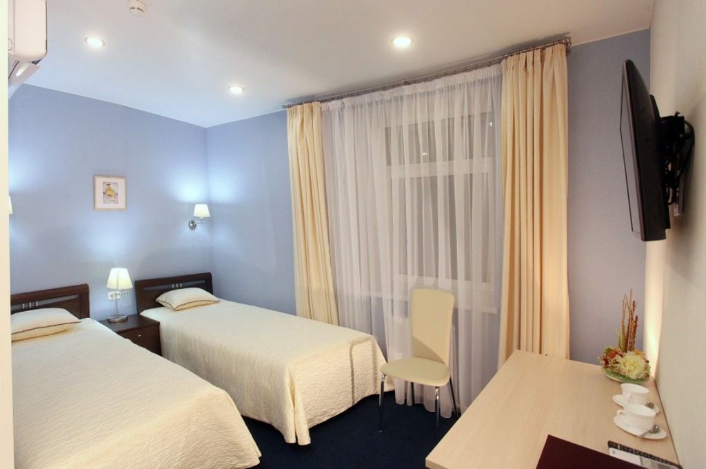 Двухместный номер с 2 отдельными кроватями стандарт