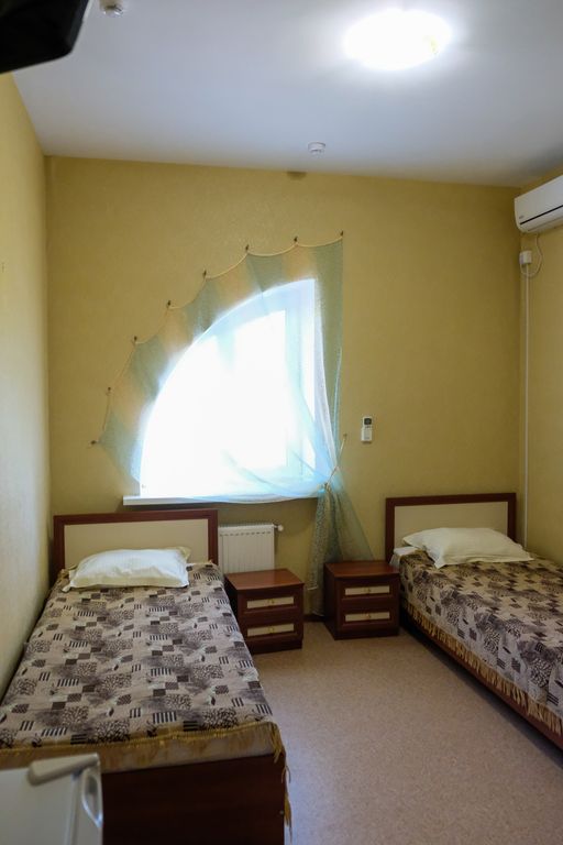 Двухместный номер с 2 отдельными кроватями стандарт