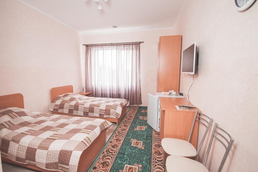 Двухместный номер с 2 отдельными кроватями стандарт