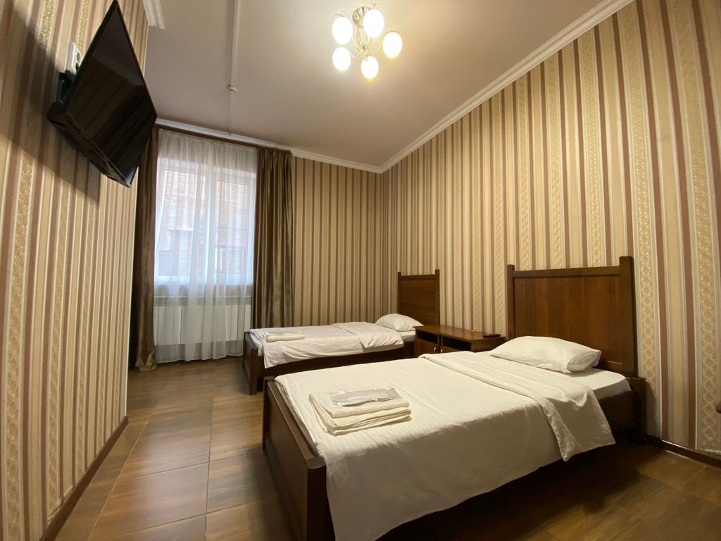 Двухместный номер с 2 отдельными кроватями стандарт