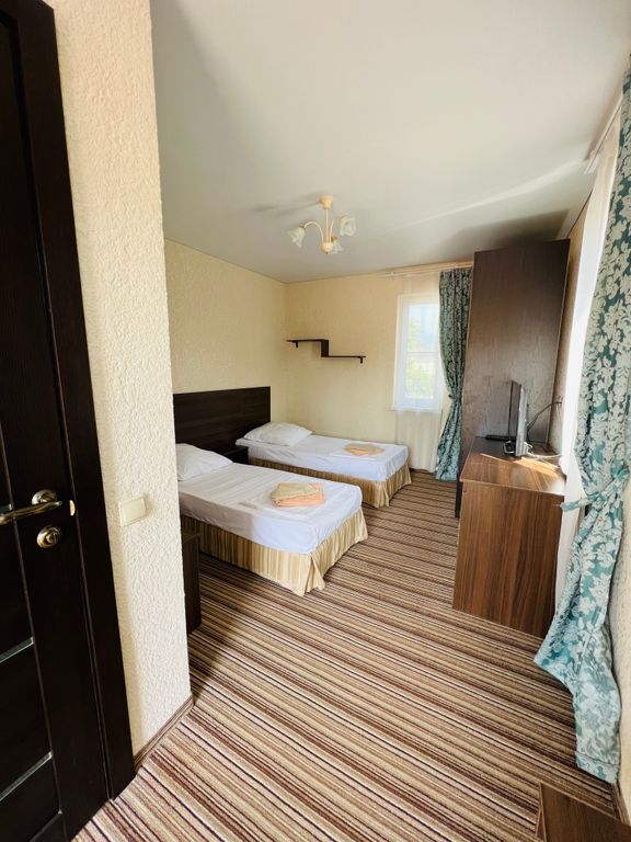 Двухместный номер с 2 отдельными кроватями стандарт