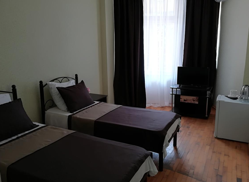 Двухместный номер с 2 отдельными кроватями эконом