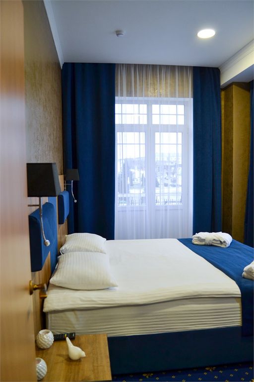 Четырёхместный номер Люкс с двумя балконами