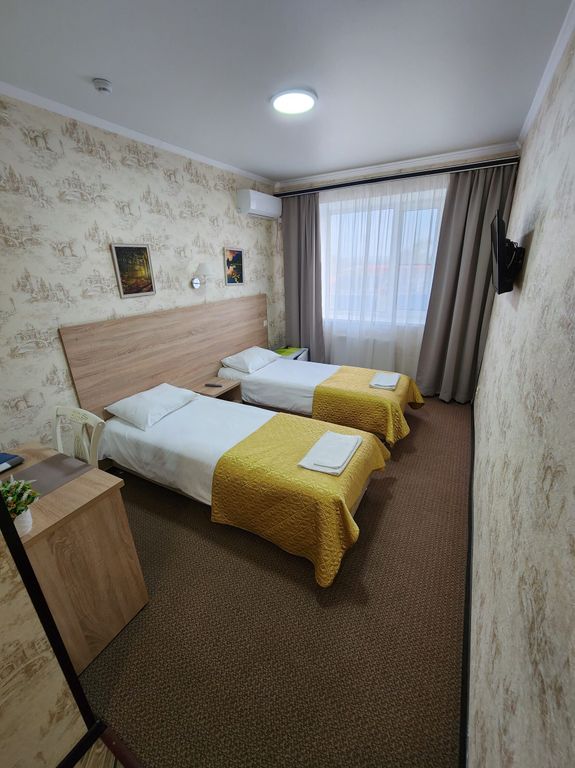 Двухместный номер с 2 отдельными кроватями стандарт