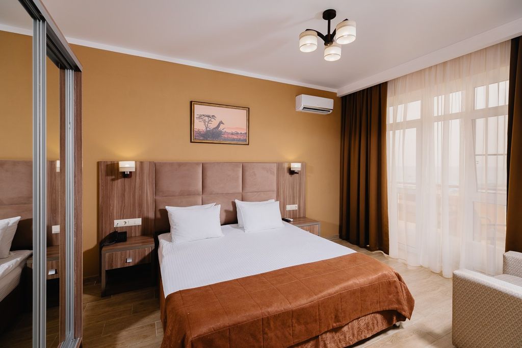 Четырёхместный номер люкс с видом на море в корпусе Прайд