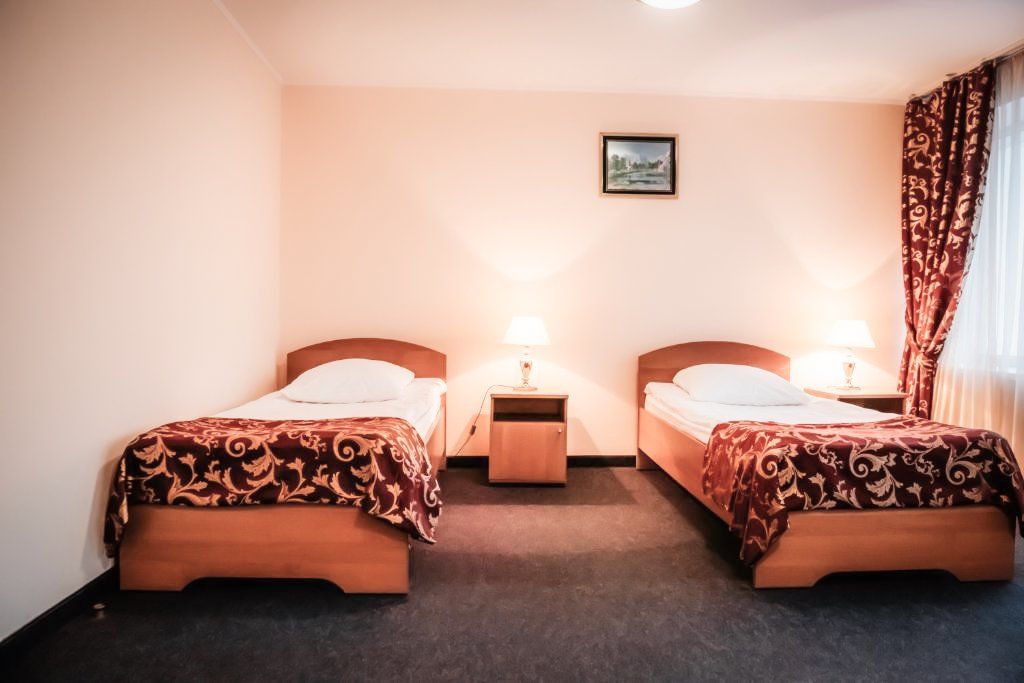 Двухместный номер с 2 отдельными кроватями стандарт