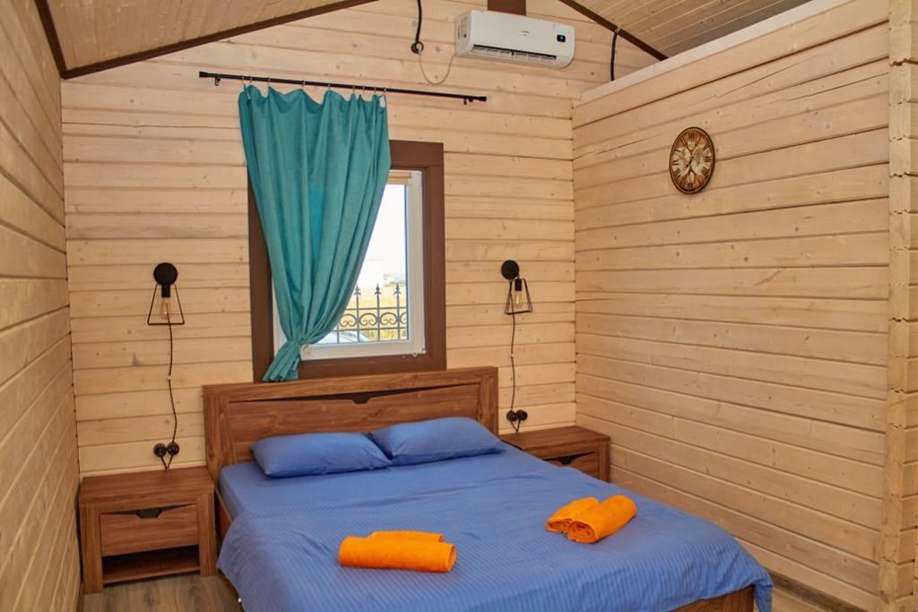 Дом уютный из бруса деревянный