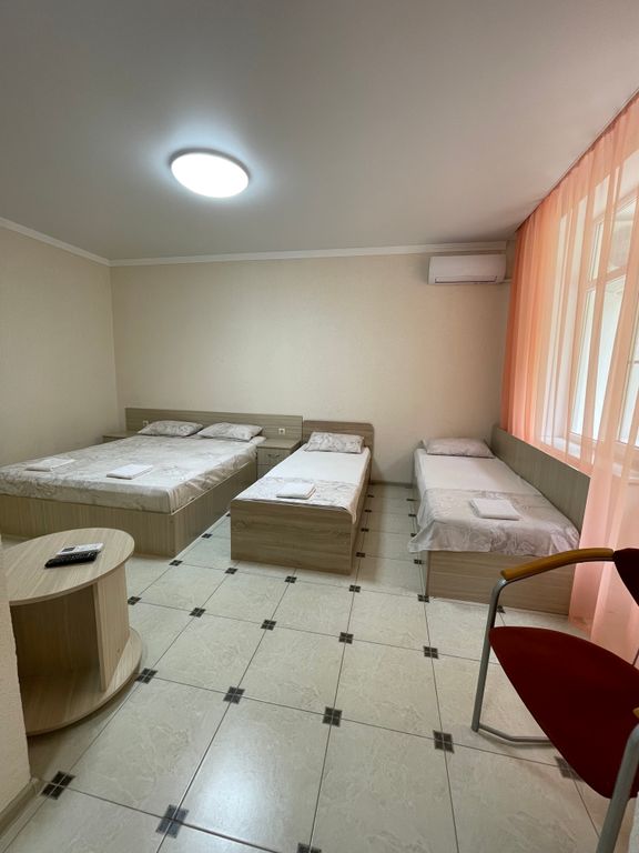 Четырёхместный номер стандарт с балконом