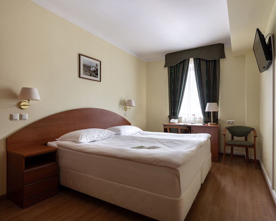 Двухместный номер с 2 отдельными кроватями или 1 двуспальной кроватью стандарт