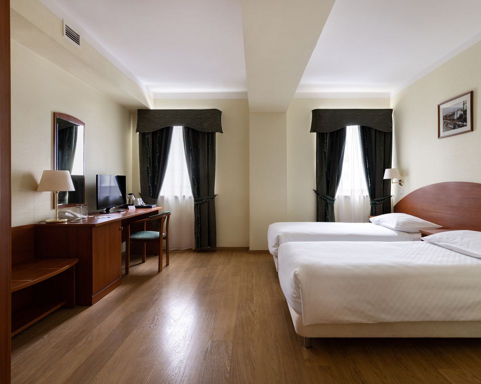 Двухместный номер с 2 отдельными кроватями улучшенный