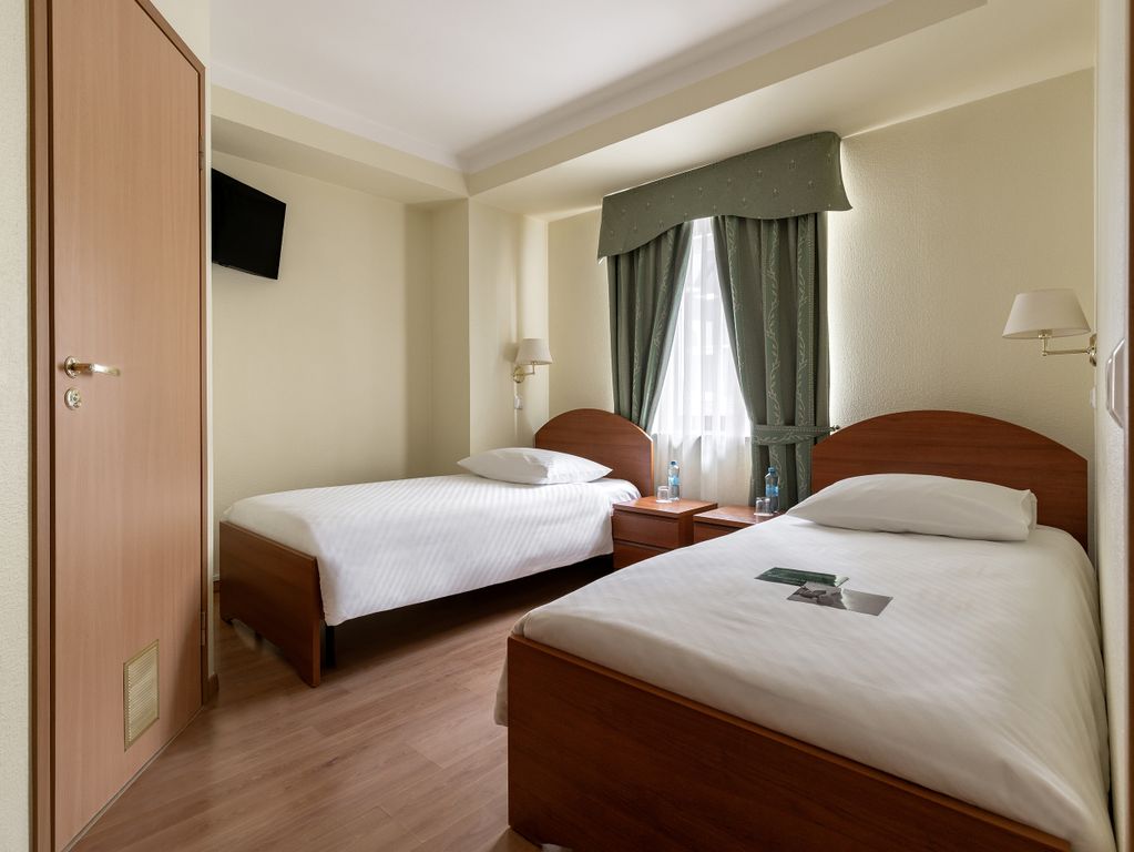 Двухместный номер с 2 отдельными кроватями полулюкс