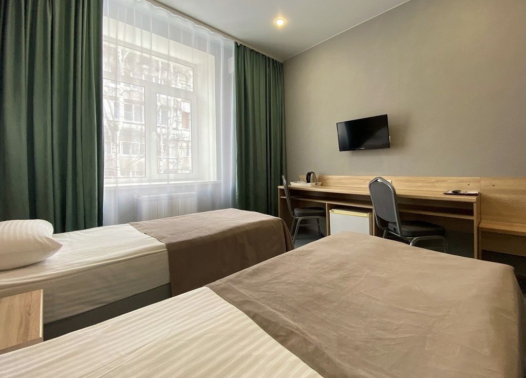 Двухместный номер с 2 отдельными кроватями стандарт улучшенный