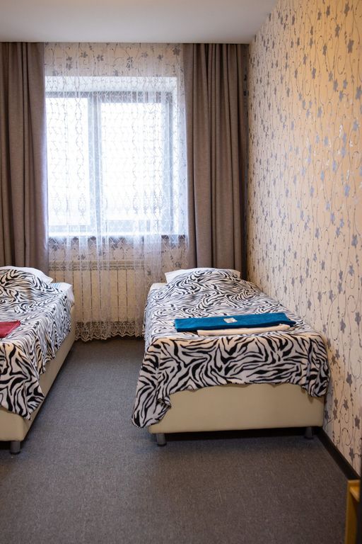 Двухместный номер с 2 отдельными кроватями эконом № 1