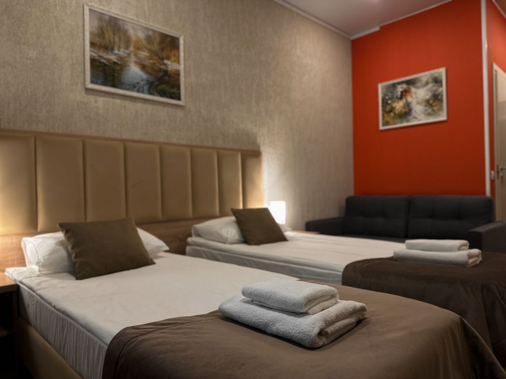 Двухместный номер с 2 отдельными кроватями улучшенный