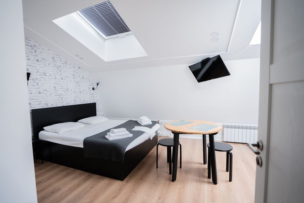 Апартаменты мансарда с двуспальной кроватью