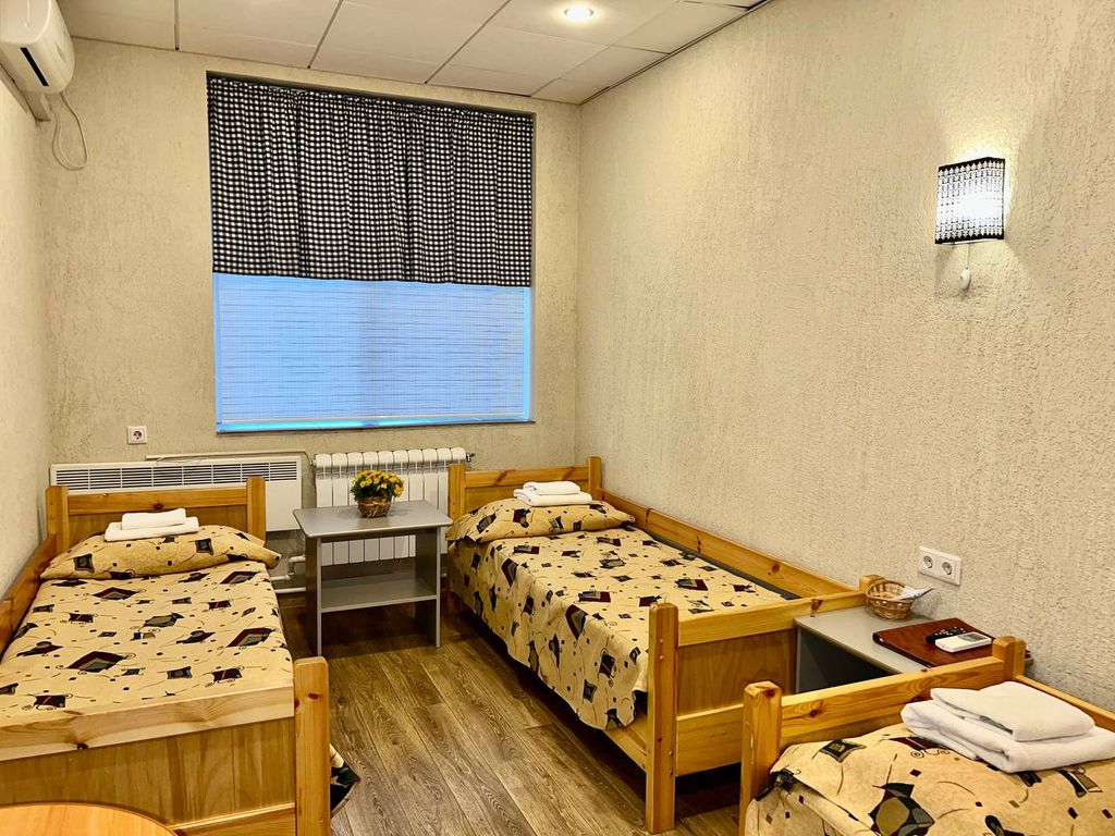 Семейный номер с отдельными кроватями