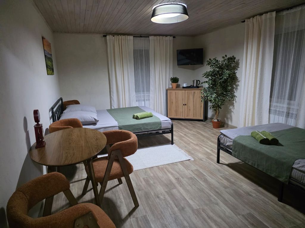 Четырёхместный номер улучшенный с видом на горы