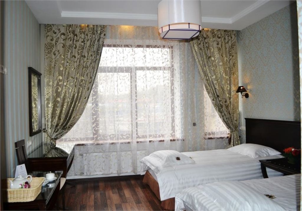 Двухместный номер с 2 отдельными кроватями Junior suite комфорт