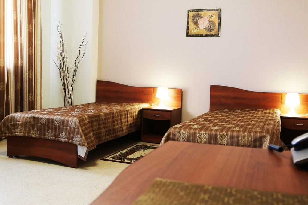 Двухместный номер с 2 отдельными кроватями стандарт