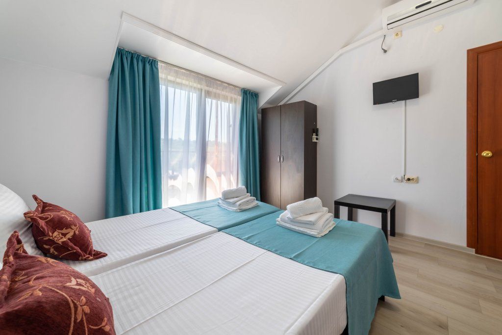 Двухместный номер с 2 отдельными кроватями стандарт