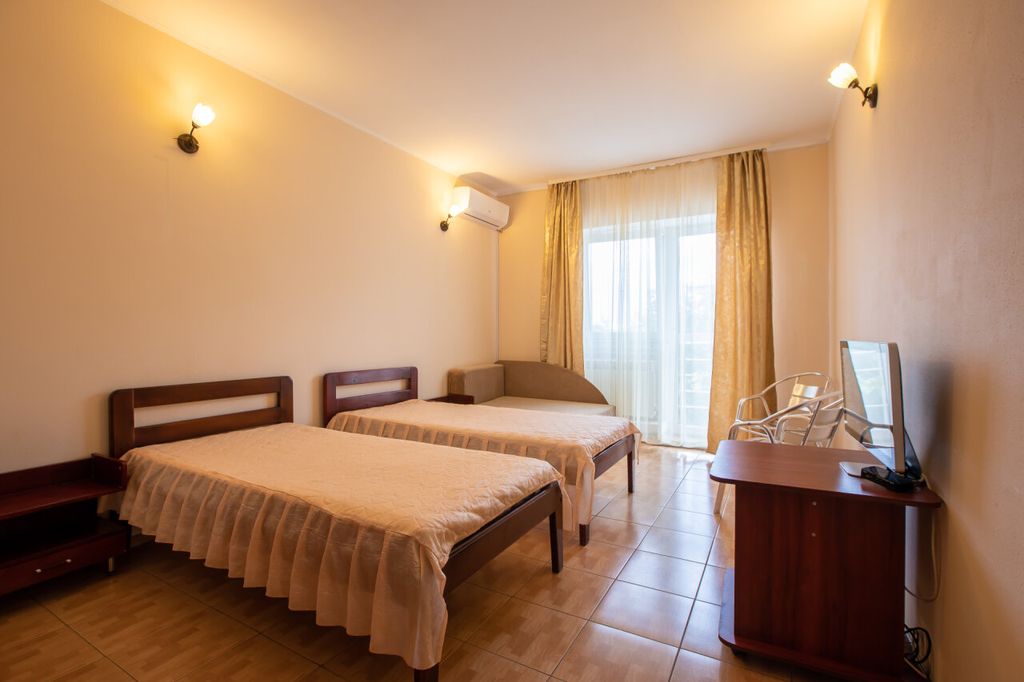 Двухместный номер с 2 отдельными кроватями стандарт