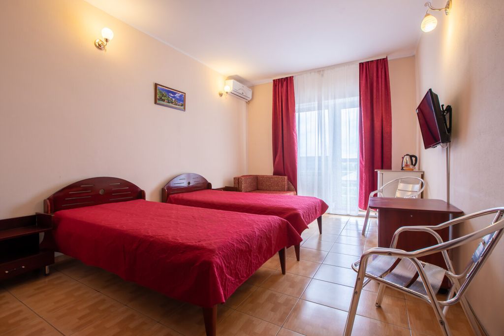 Двухместный номер с 2 отдельными кроватями улучшенный