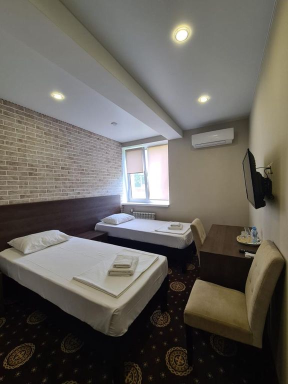 Двухместный номер с 2 отдельными кроватями эконом