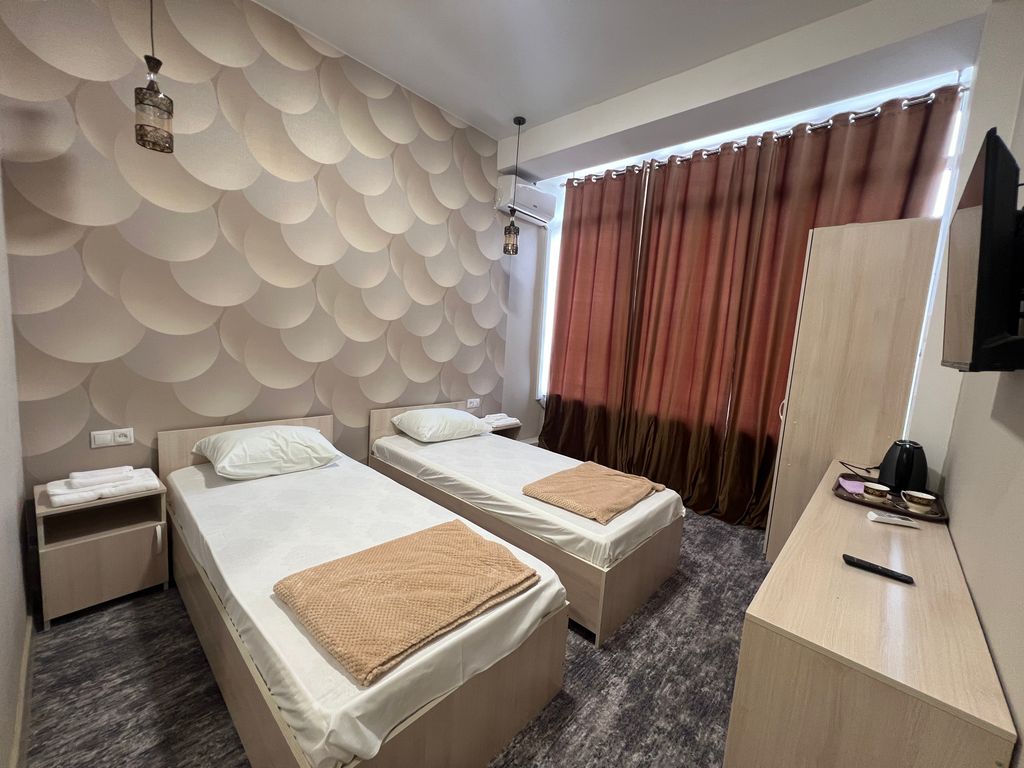 Двухместный номер с 2 отдельными кроватями стандарт