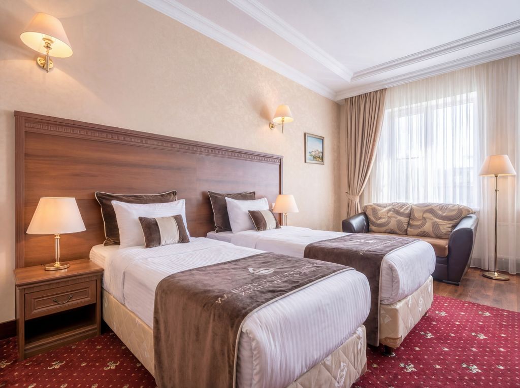 Двухместный номер с 2 отдельными кроватями улучшенный с видом на город