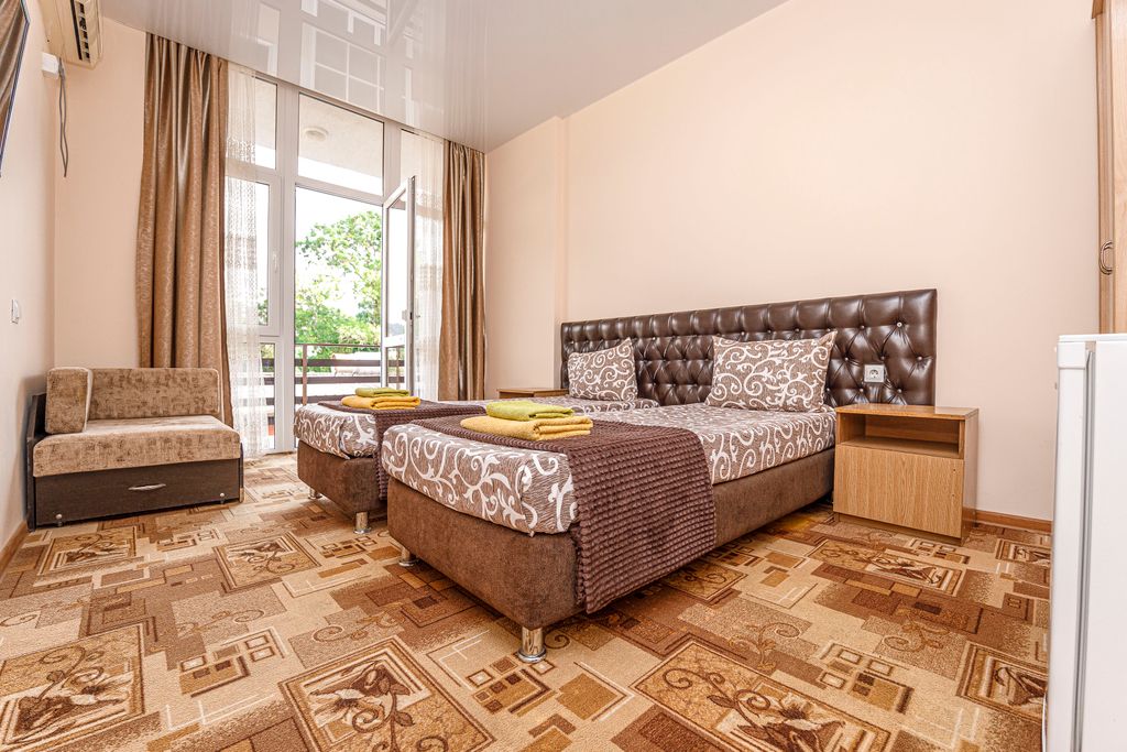 Двухместный номер с 2 отдельными кроватями улучшенный с балконом