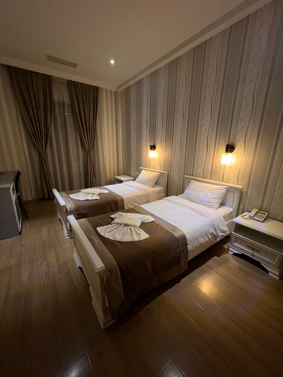 Двухместный номер с 2 отдельными кроватями стандарт