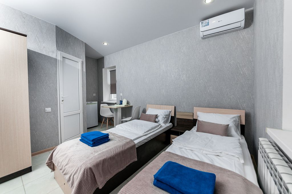 Двухместный номер с 2 отдельными кроватями стандарт