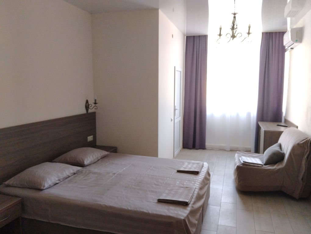 Четырёхместный номер стандарт с видом на горы