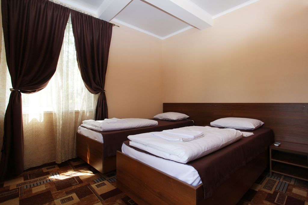 Двухместный номер с 2 отдельными кроватями улучшенный