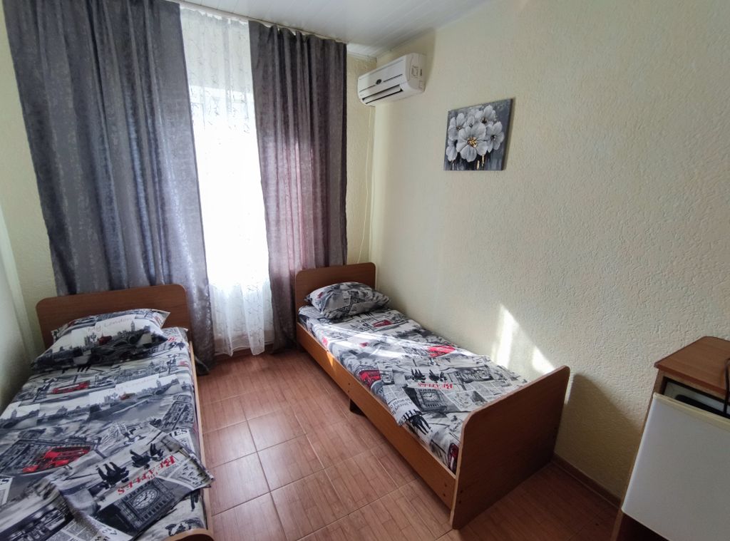 Двухместный номер с 2 отдельными кроватями эконом класса