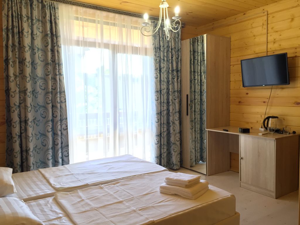 Двухместный номер с 2 отдельными кроватями + диван-кровать