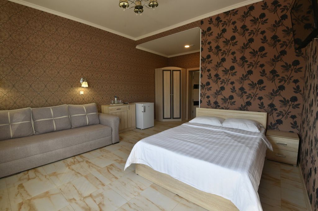 Четырёхместный номер Люксы с балконом