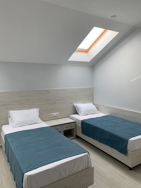 Двухместный номер с 2 отдельными кроватями стандарт твин мансарда