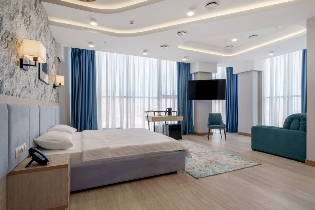 Трёхместный номер deluxe c ванной