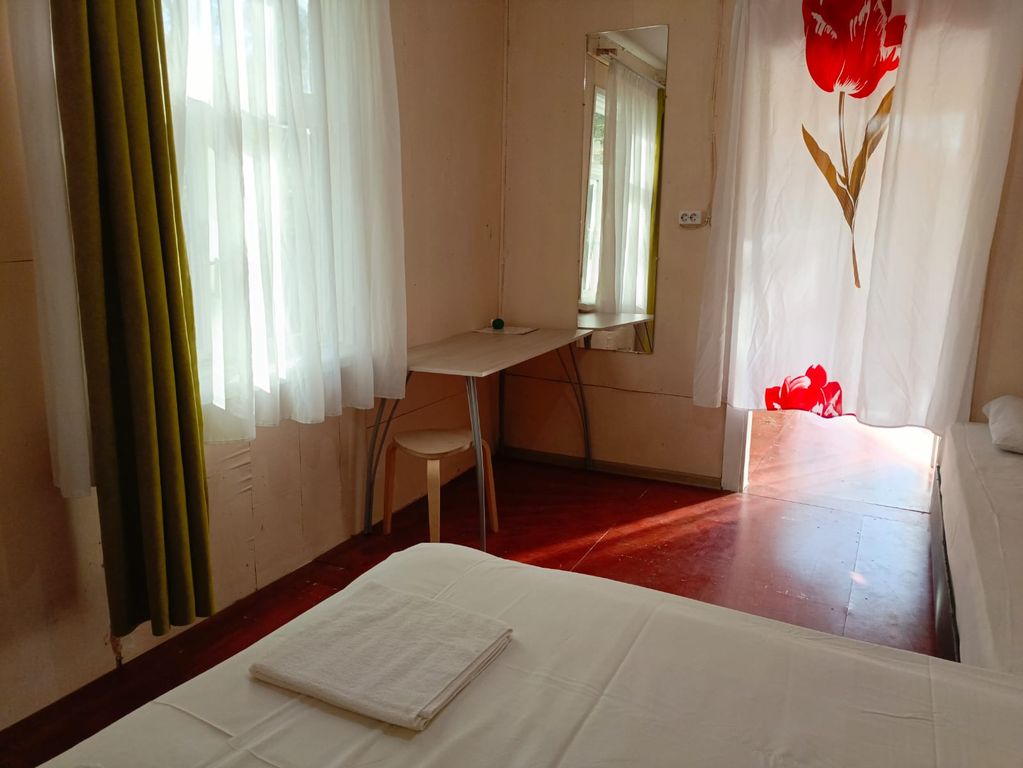 Двухместный номер с 2 отдельными кроватями Бюджетный двухместный номер с 2 раздельными кроватями и своим туалетом