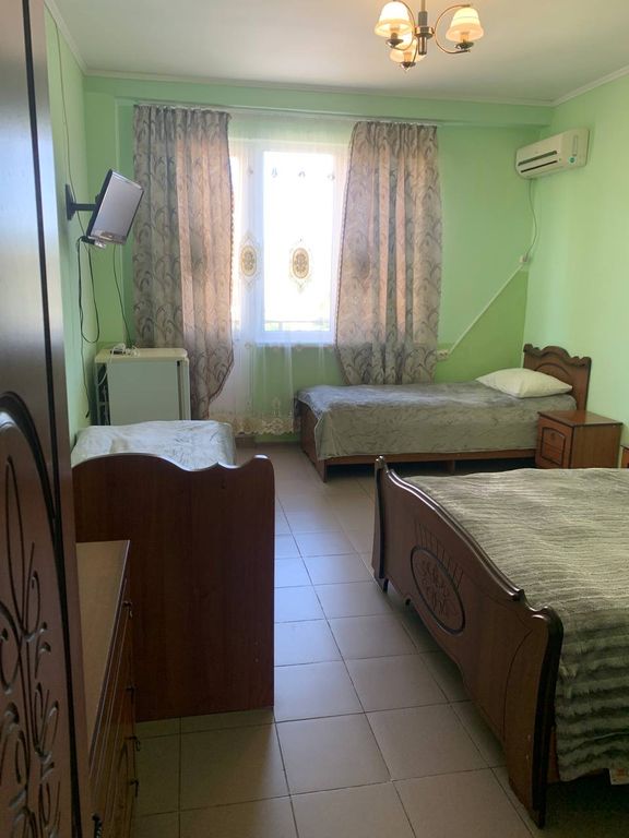 Четырёхместный номер стандарт с балконом