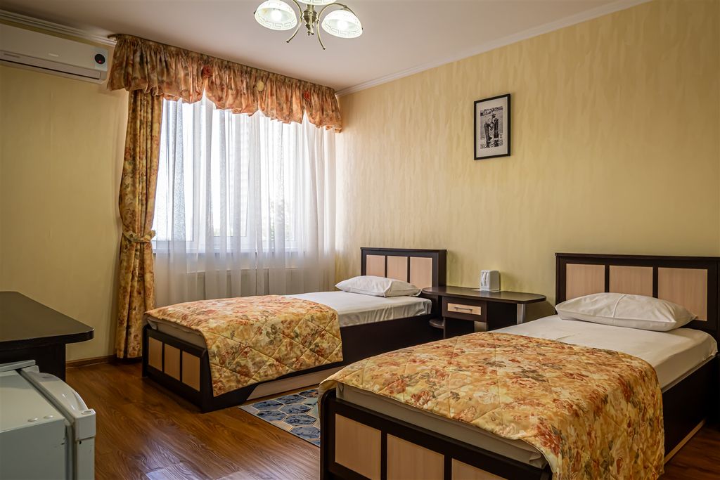 Двухместный номер с 2 отдельными кроватями стандарт