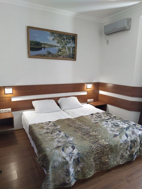 Двухместный с 2 отдельными кроватями Двухместный с двумя кроватями и видом на море