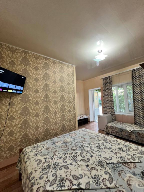 Трёхместный номер улучшенный с видом на горы