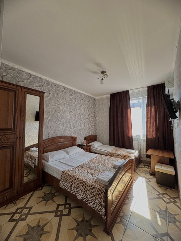 Трёхместный номер люкс