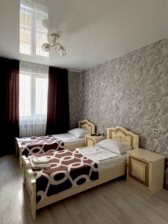 Двухместный номер с 2 отдельными кроватями люкс